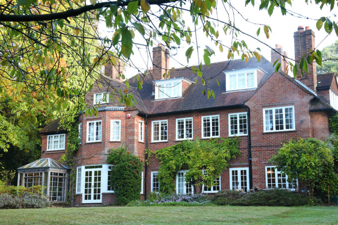 Surrey home set in treed garden