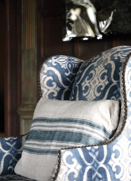 upholstered blue and white chair