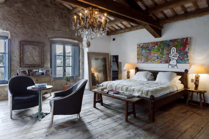 interior design styles come together in an ancient and protected Catalan farmhouse renovation.