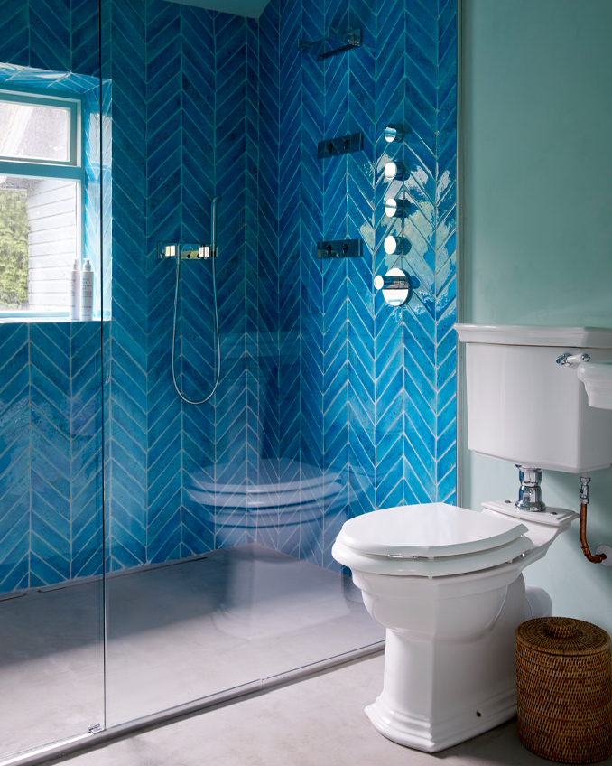 Amazing blue handmade bathroom titles in a country house shower room. One of the many room interior design ideas from Interior Designer, Ana Engelhorn.